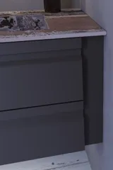 Stor baderomsinspirasjon med grå servantskap med integrert håndtak, stilfull sidemontert vask, kvadratisk speil med avrundede hjørner, vegger i betonglook og rå materialer for et urbant uttrykk